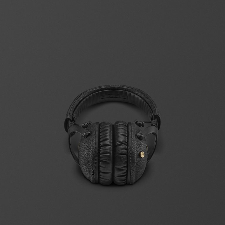 Marshall Monitor III A.N.C. Black over-ear bluetooth headphones featuring a small gold accent on one side, displayed against a dark background.