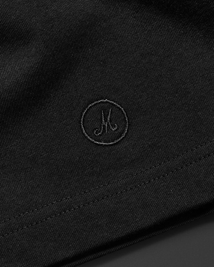 Close-up embroidery on the Hendrix Shadow T-shirt.