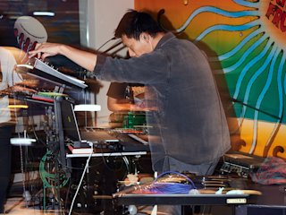 A DJ vibing and spinning tunes