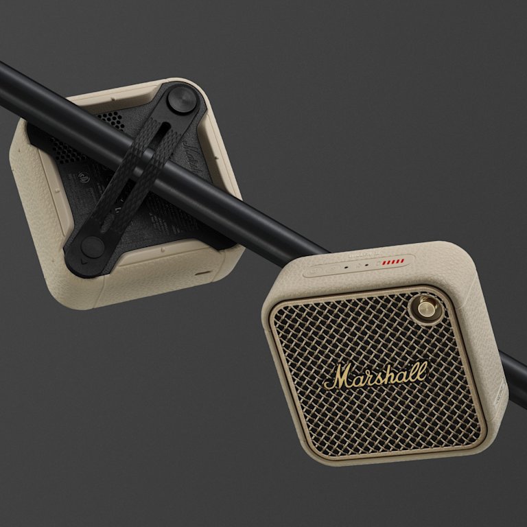 Two Marshall Willen II Cream speakers mounted on a horizontal black pole.