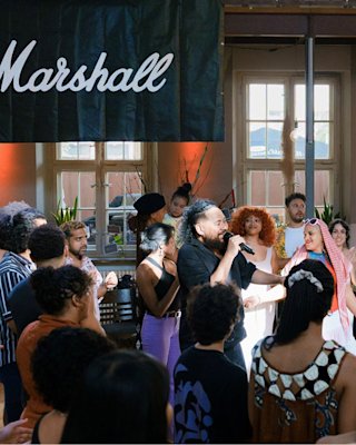 People from Roots Berlin vibing and singing together