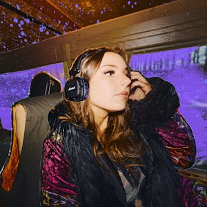 Ally Venable listening to music through the new Major V Hendrix Edition