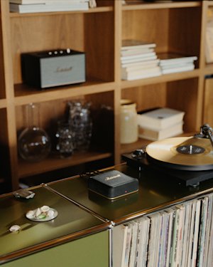 Heddon placed in a stylish living room next to record player