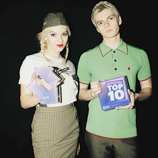 The Molotovs holding a prize they won