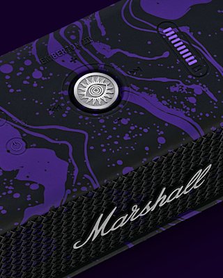 Close-up of a Marshall Emberton III Hendrix Edition speaker with a purple splatter design, silver control knob, and the Marshall logo on the grille.