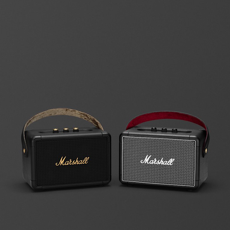 Two portable Marshall KILBURN II Bluetooth speakers on a grey background.