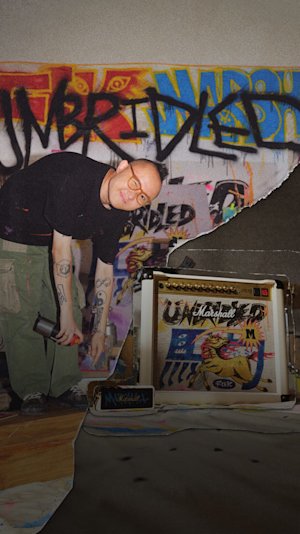 A man is standing bent over in a graffiti environment with an amp, featuring the Lunar New Year 2026 edition.