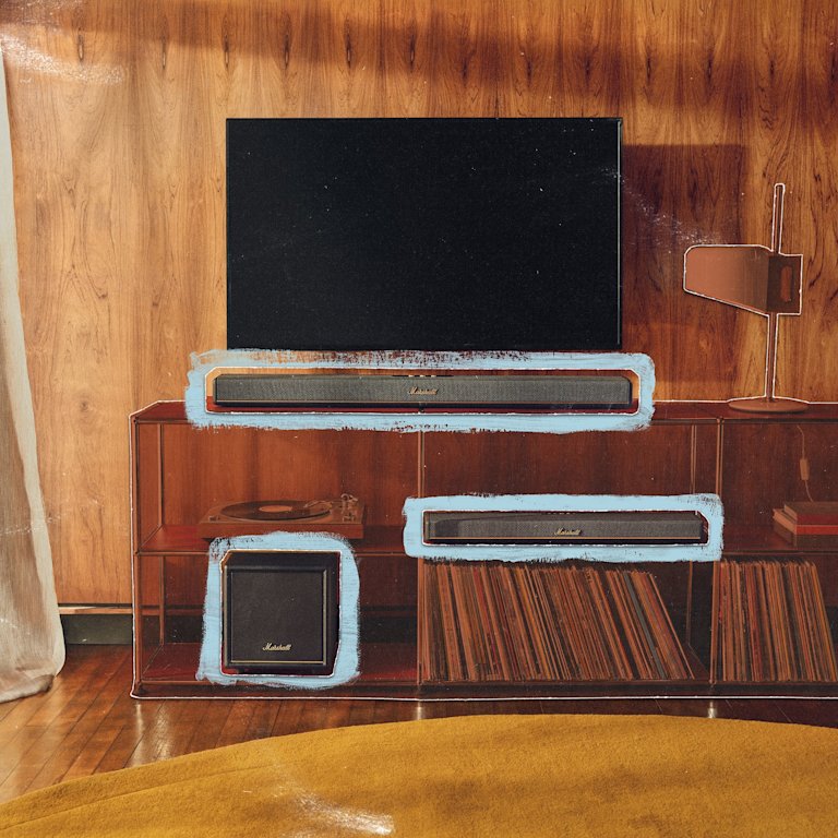 Marshall Heston soundbar and TV subwoofer are arranged on wooden shelves against a wood-paneled wall.