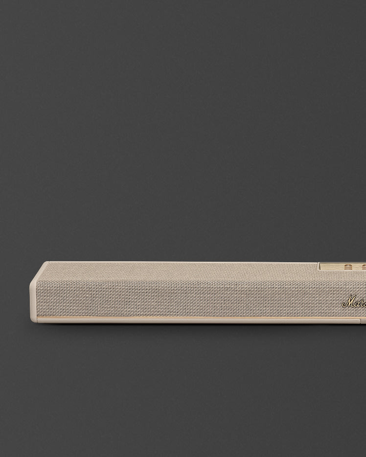 El lado izquierdo de la barra de sonido Heston 120 Cream sobre un fondo oscuro.