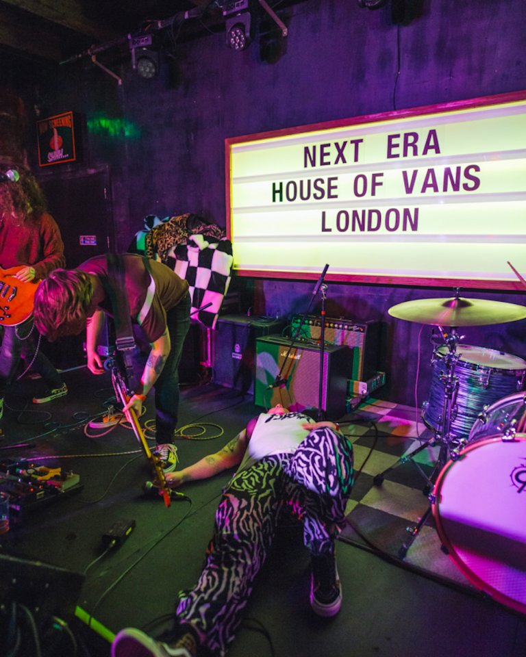 Singer and guitarist from Gen and the Degenerates playing.