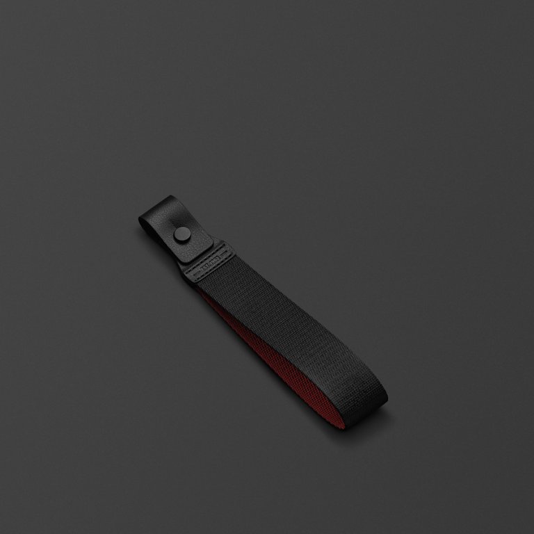 Middleton II Black and Brass Strap against a dark background.