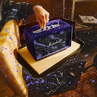Acton III Hendrix Edition on the table with purple splashes.