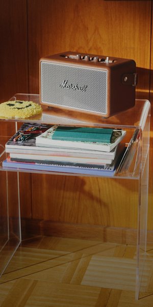 The Marshall kilburn III Brown in the corner of a living room