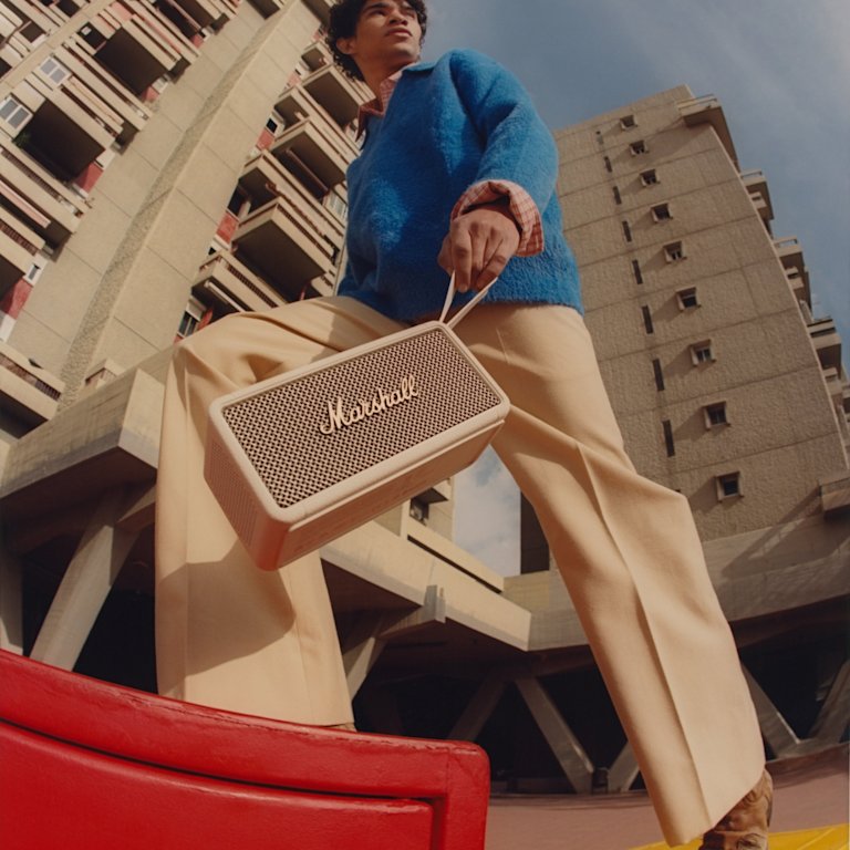 Marshall Middleton Cream speaker positioned on a red box.