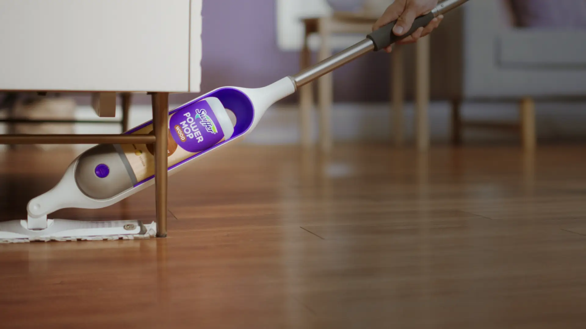 Power mop cleaning wooden floor