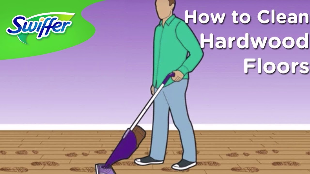 How to Clean Hardwood Floors - A man using a vacuum cleaner