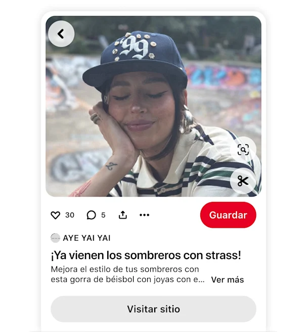 Pin de Pinterest de la marca AYE YAI YAI en el que se muestra una gorra de béisbol con joyas y un enlace a un sitio web.