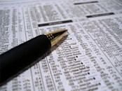 pen on newspaper stocks quotes