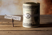 Dividend with Stack of Money