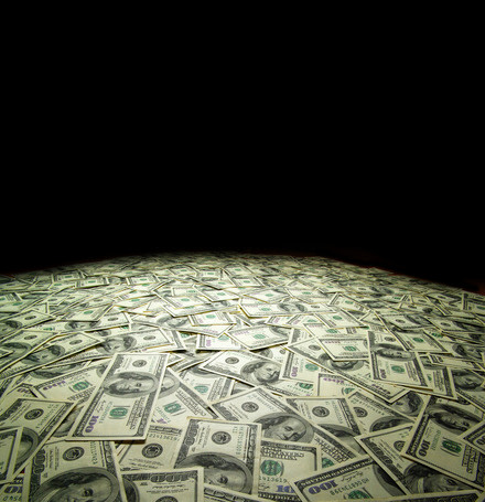 money pile on black