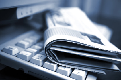 Folded newspaper on a keyboard
