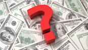 Question mark on stack of money