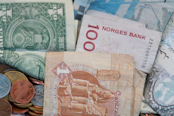 Different currencies stacked on top of each other