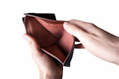 Man holding empty wallet.