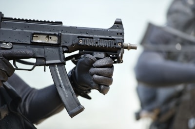 rifle in hands of soldier