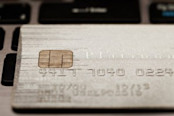 Platinum credit card with half the numbers on it