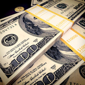 Picture of two cash piles