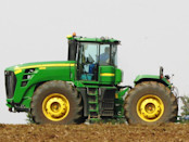 green tractor on field