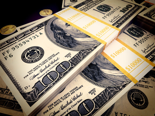 Stack of money with yellow bands