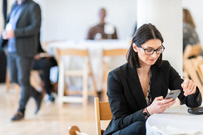 Woman looking at phone - SKO20