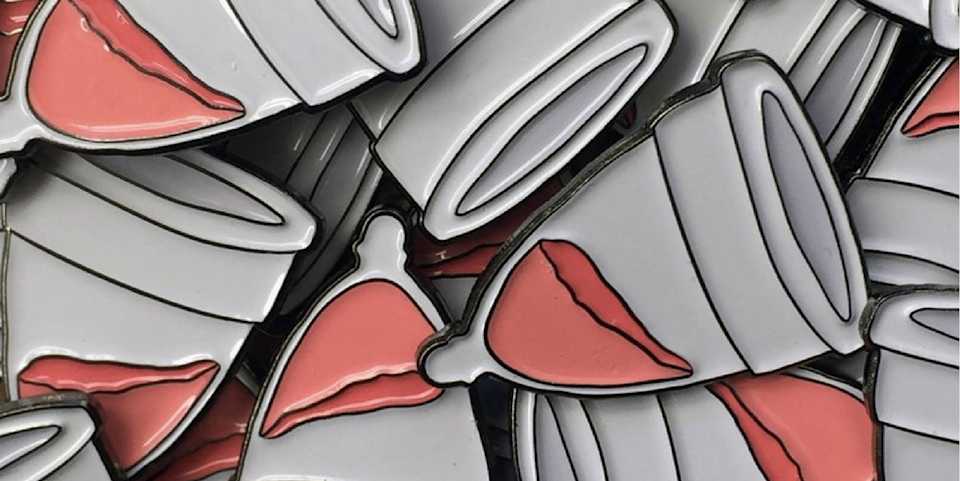 pile of several iron pins of menstrual cups