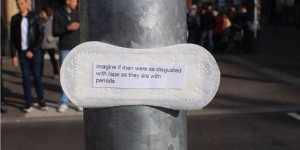 pad with sentence on periods on metal pole