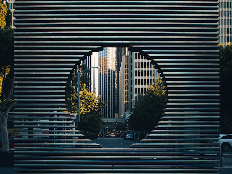 Image looking through a circle to a cityscape