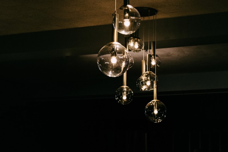 Image of suspended spherical transparent pendant lights