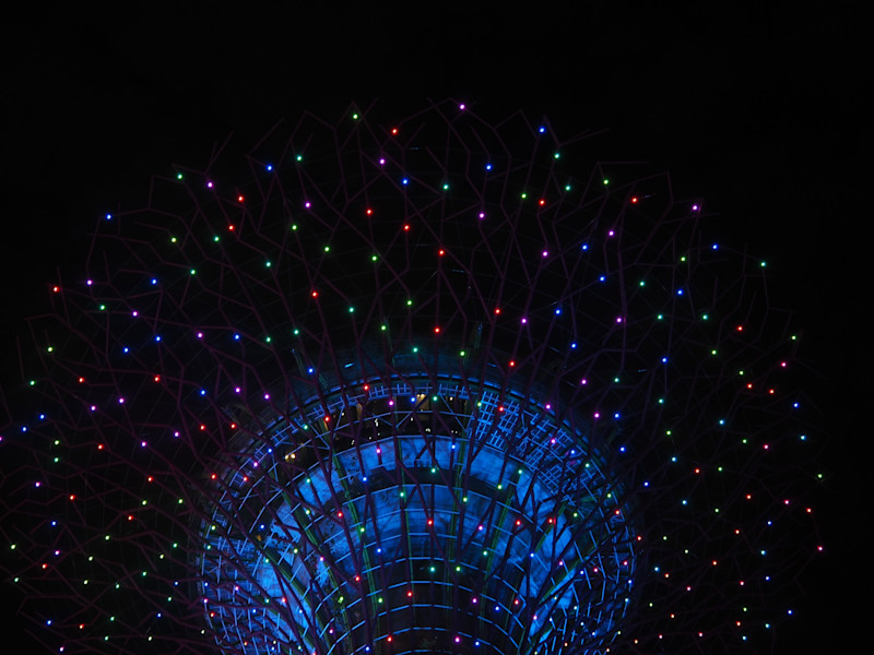 Image of lights ascending from a circular building