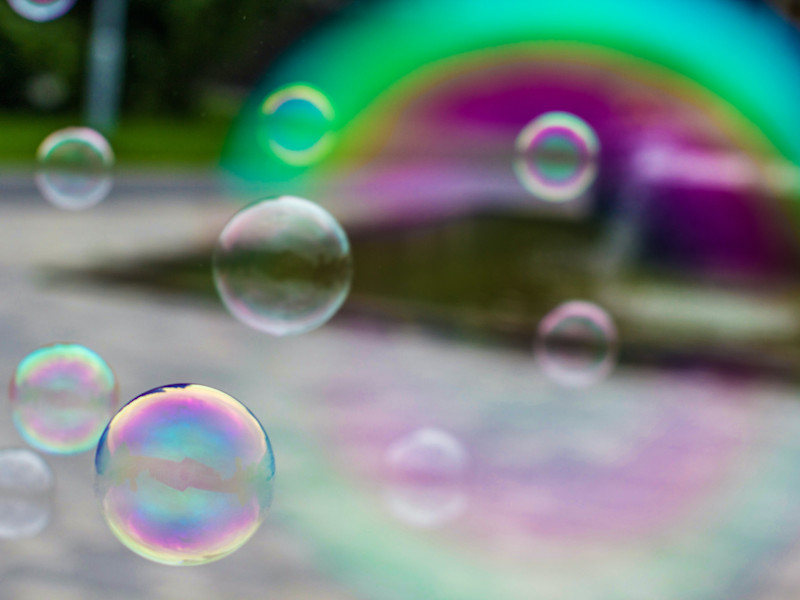 Close up of a series of bubbles floating in the air