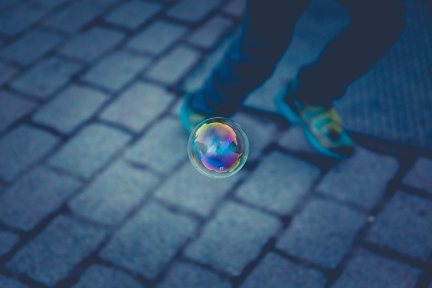 Image looking down a bubble floating through the air