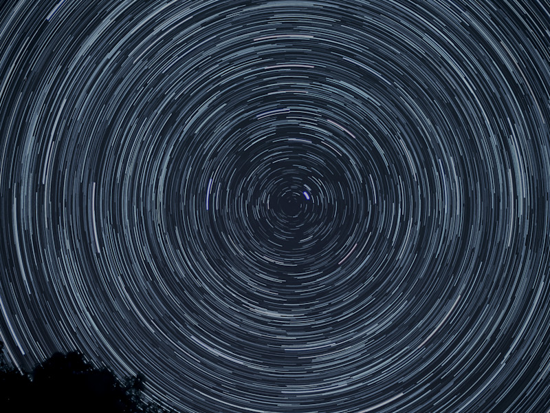 Image of a digital swirl pattern in the sky