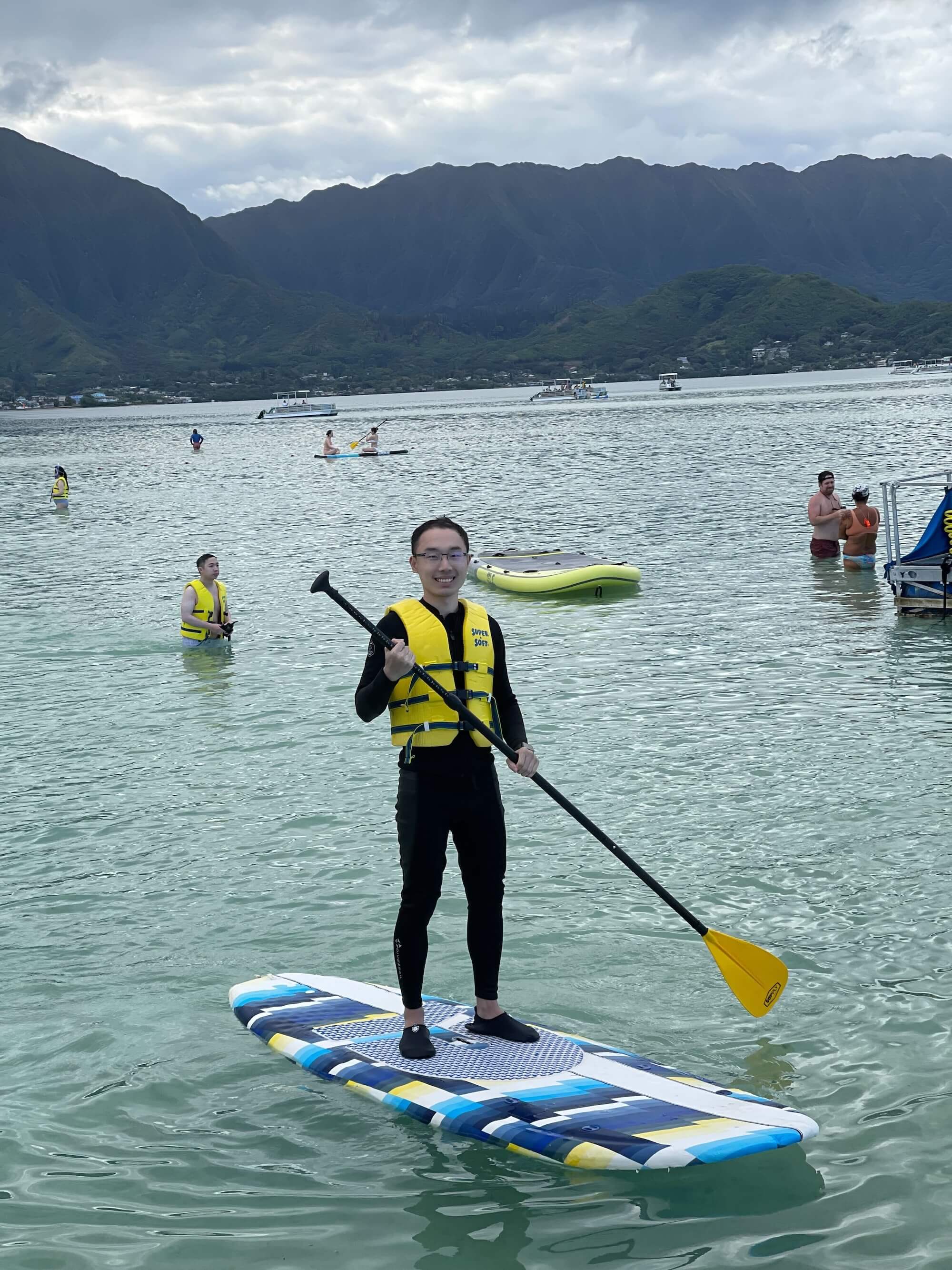Jihai Xu paddle boarding.