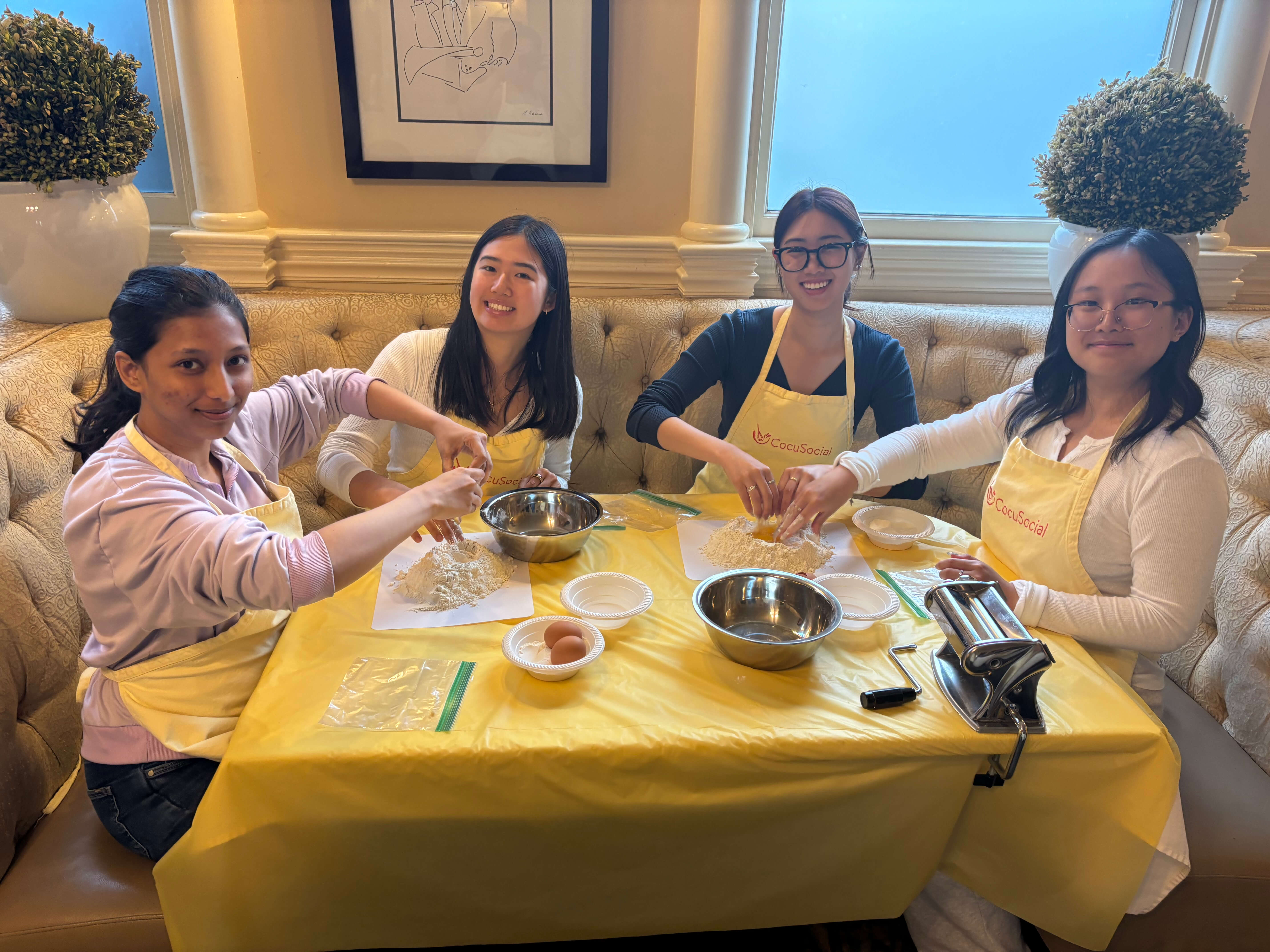 Four Rippling interns making pasta together.