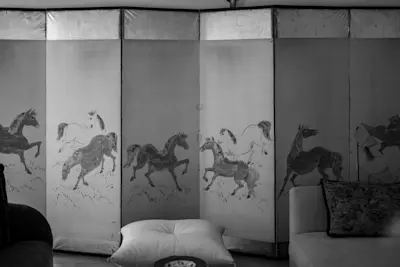 Japanese Byobu screen with hand painted horses, silver leaf and black lacquer edge.