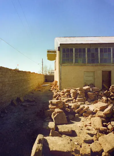 Adobe bricks and west building. Photo 1973.
