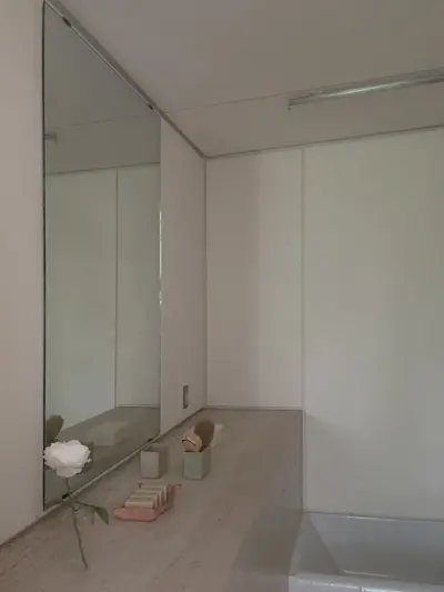The travertine counter is created by the travertine void housing the fireplace.