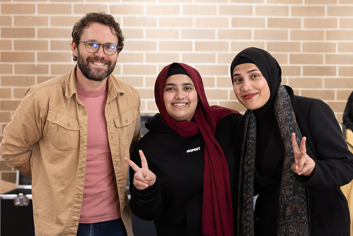 Social designer Tasman Munro with Asma Nayim Ullah and Sajeeda Bahadurmia, co-founders of the Australian Rohingya Women's Development Organisation (ARWDO). Image: Abril Felman / City of Sydney