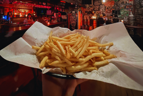 Sizing up the chips at burger joint Mary&#39;s. Image: City of Sydney / Abril Felman