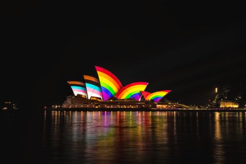 The Opera House is lit with the colours of the Progress Pride flag to launch Sydney World Pride in 2023. Photo: Phillip Glanz.